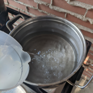 Water being poured into a pan